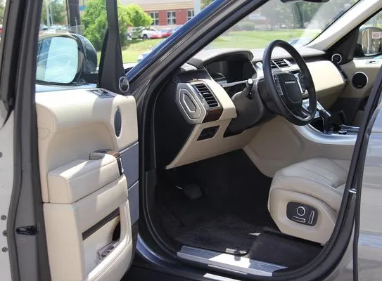 Freshly detailed cream-leather interior, vacuumed and protectant-treated