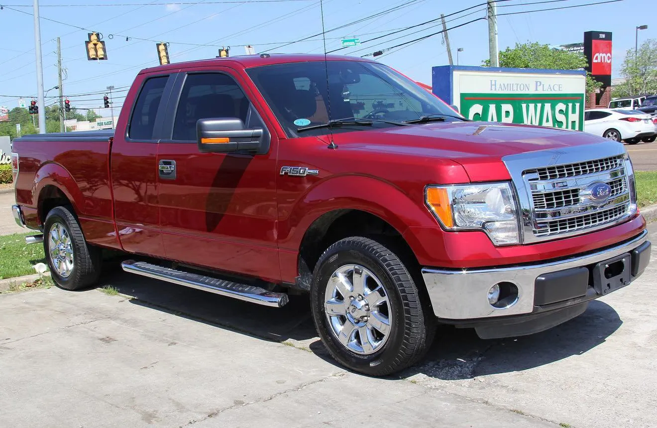 A freshly washed Ford F-150 beading water on the lot at Hamilton Place Car Wash & Detail